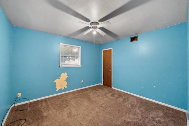 unfurnished room with ceiling fan, carpet flooring, and baseboards