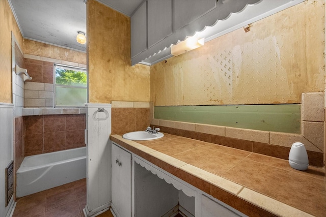 full bath featuring tile patterned flooring, vanity, a bath, a shower, and tile walls