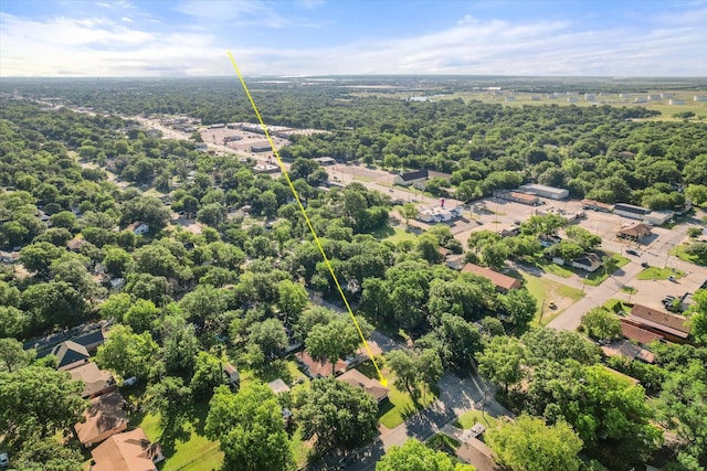 drone / aerial view of a heavily wooded area