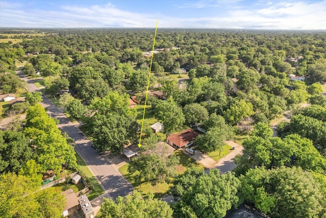 drone / aerial view of a heavily wooded area