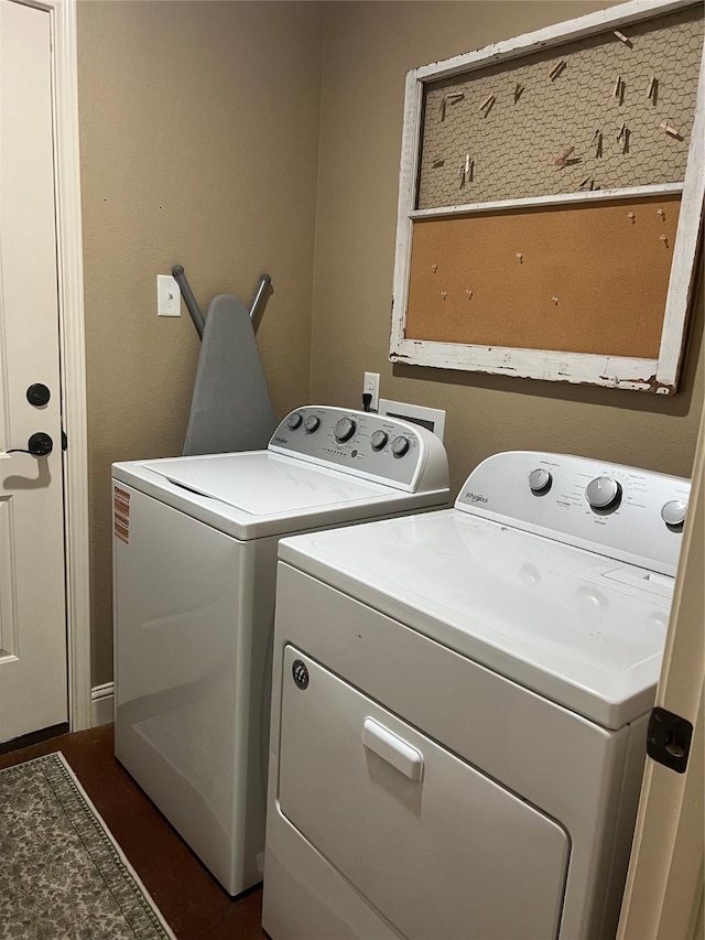 laundry area featuring washer and clothes dryer