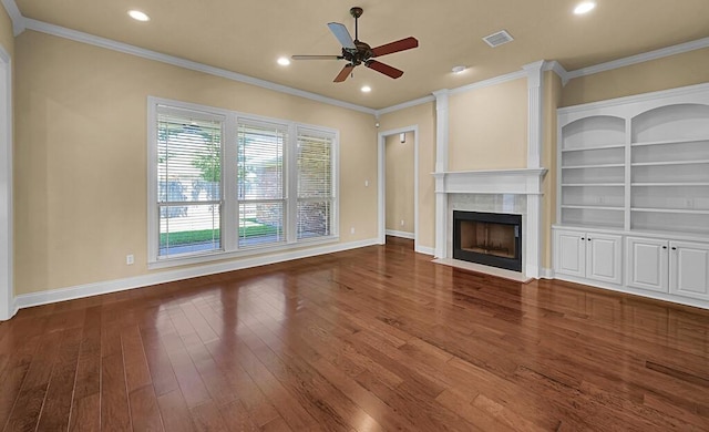 1105 Charing Cross Dr, Waco, TX 76712 - unfurnished living room with a ceiling fan, a premium fireplace, wood finished floors, crown molding, and baseboards