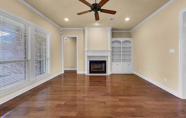 1105 Charing Cross Dr, Waco, TX 76712 - unfurnished living room featuring a ceiling fan, wood finished floors, ornamental molding, a fireplace with flush hearth, and baseboards