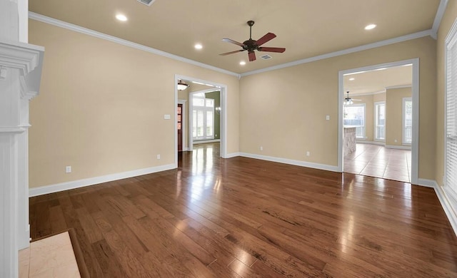 1105 Charing Cross Dr, Waco, TX 76712 - unfurnished living room featuring ceiling fan, wood-type flooring, baseboards, ornamental molding, and recessed lighting