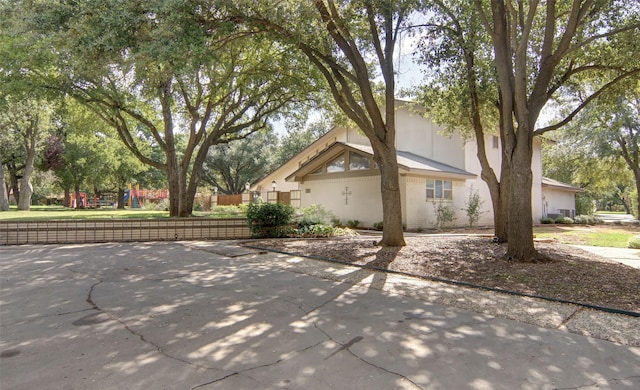 1022 Kintner Dr, Graham, TX 76450 - view of side of home with a playground