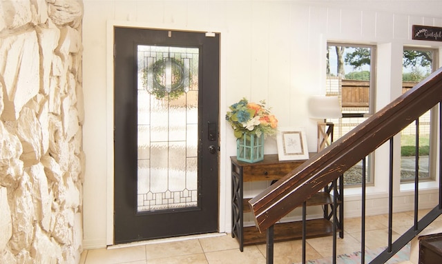 1022 Kintner Dr, Graham, TX 76450 - tiled foyer entrance with stairway and baseboards