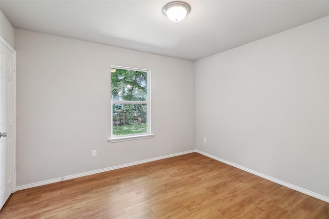 12824 Seagoville Rd, Balch Springs, TX 75180 - empty room featuring light wood-type flooring and baseboards