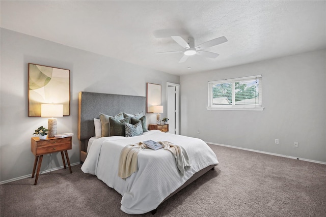bedroom featuring carpet floors, baseboards, and a ceiling fan