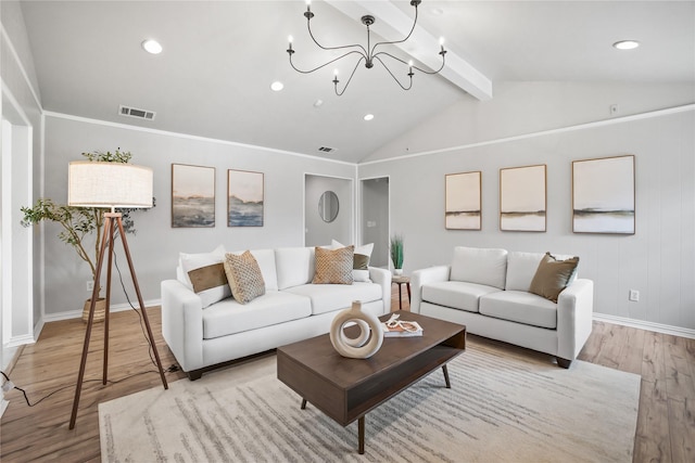 living area with wood finished floors, baseboards, a chandelier, and recessed lighting