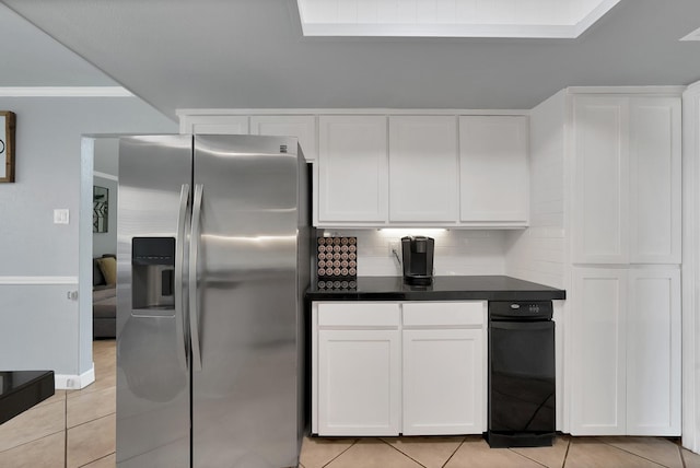 1503 Hindsdale Dr, Richardson, TX 75081 - kitchen featuring stainless steel fridge, light tile patterned floors, dark countertops, white cabinetry, and decorative backsplash