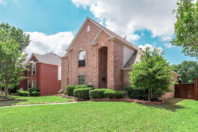 traditional home with brick siding and roof with shingles