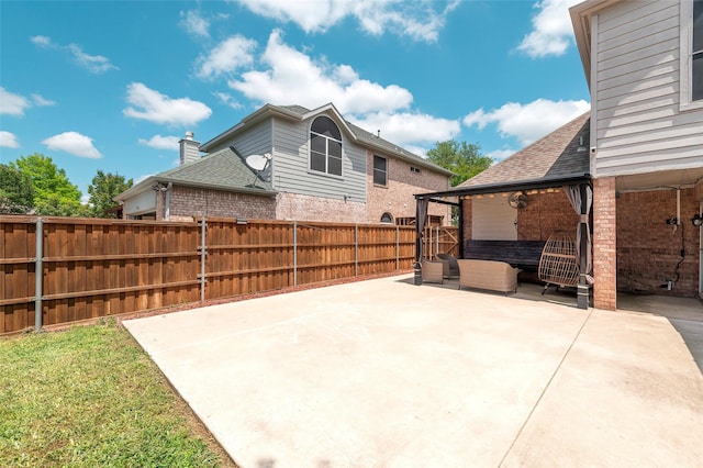 view of patio featuring outdoor lounge area and a fenced backyard