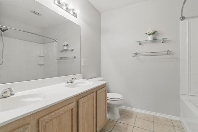 bathroom featuring tile patterned flooring, toilet, double vanity, baseboards, and  shower combination