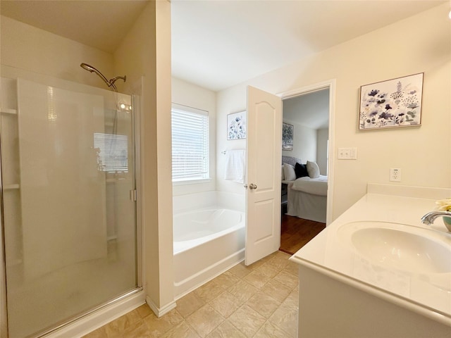 2041 Matador Ranch Rd, Fort Worth, TX 76134 - ensuite bathroom featuring a stall shower, a garden tub, and vanity