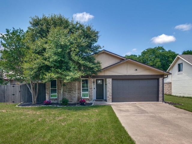 view of front facade with a garage and concrete driveway
