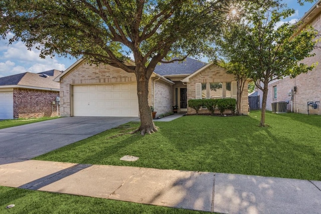 ranch-style house featuring a garage, driveway, a front yard, central air condition unit, and brick siding