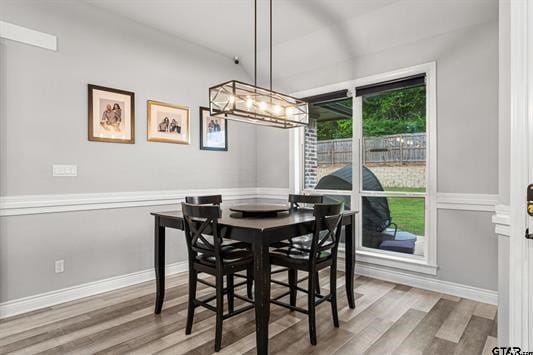 2230 Rana Park, Flint, TX 75762 - dining room with wood finished floors, plenty of natural light, and a chandelier
