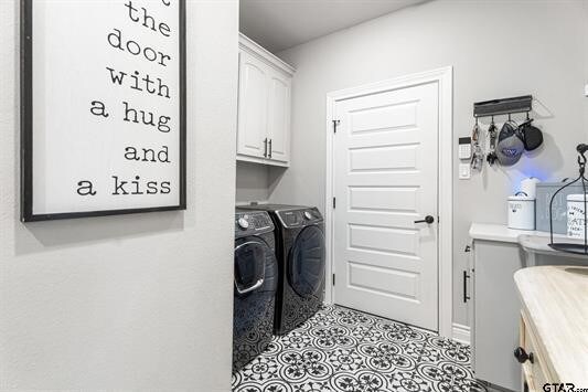 2230 Rana Park, Flint, TX 75762 - laundry room with washer and dryer and cabinet space