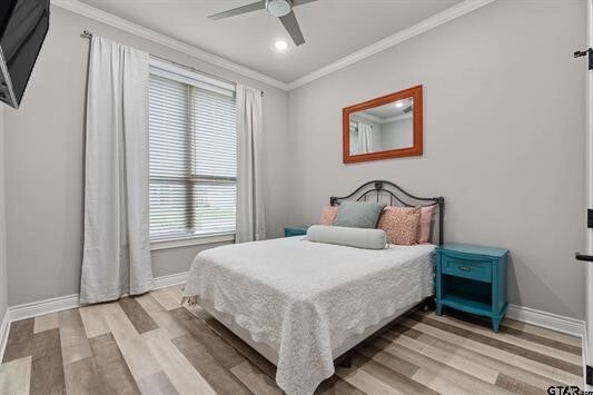 2230 Rana Park, Flint, TX 75762 - bedroom with light wood-style flooring, ornamental molding, baseboards, recessed lighting, and ceiling fan