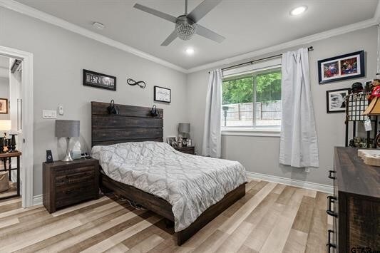 2230 Rana Park, Flint, TX 75762 - bedroom with light wood finished floors, baseboards, ornamental molding, recessed lighting, and a ceiling fan