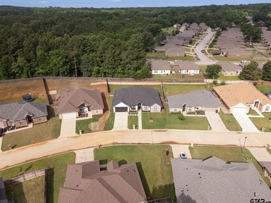 2230 Rana Park, Flint, TX 75762 - aerial view of property and surrounding area featuring nearby suburban area and a heavily wooded area