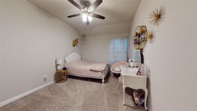 bedroom with carpet floors, vaulted ceiling, ceiling fan, and baseboards