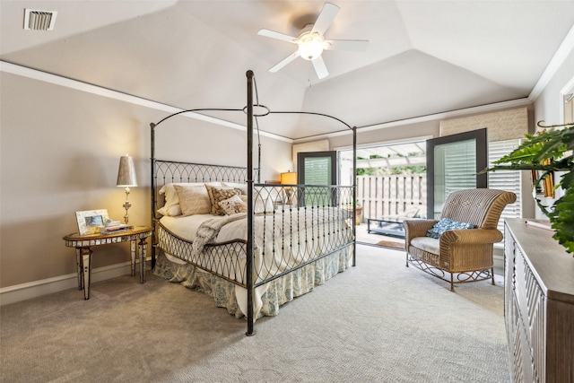 carpeted bedroom with ornamental molding, access to outside, and lofted ceiling