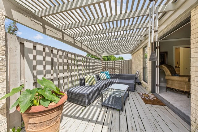 wooden terrace featuring a pergola, a fenced backyard, and outdoor lounge area