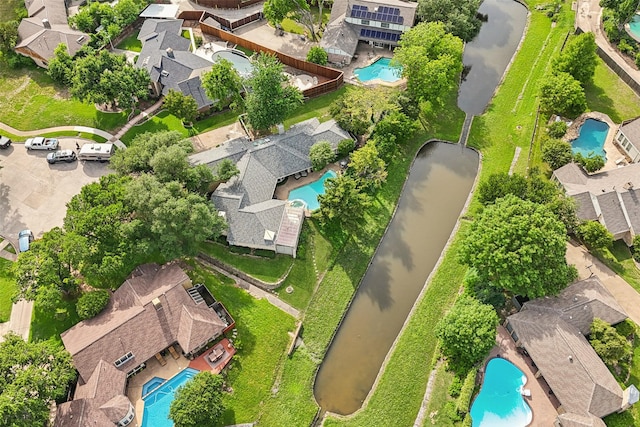 aerial view of residential area featuring a pool