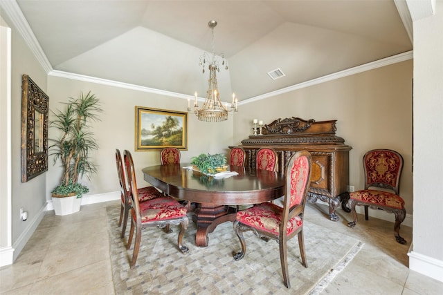 dining area with lofted ceiling, a chandelier, light tile patterned floors, ornamental molding, and baseboards