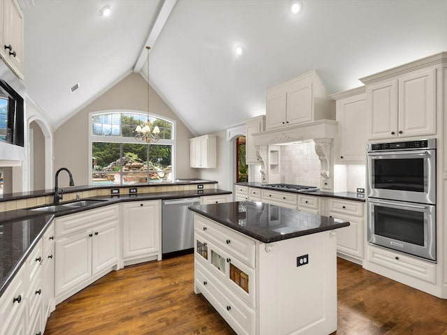 901 Saint James Dr, Fairview, TX 75069 - kitchen featuring appliances with stainless steel finishes, a sink, dark wood-style flooring, decorative backsplash, and dark stone counters