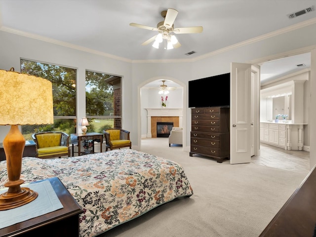 901 Saint James Dr, Fairview, TX 75069 - bedroom with a glass covered fireplace, multiple windows, carpet, ornamental molding, and a ceiling fan