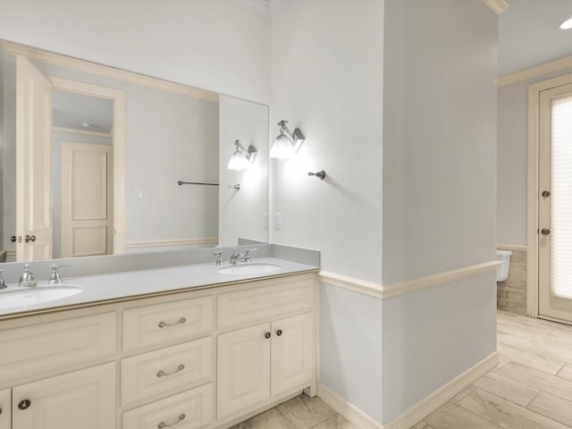 901 Saint James Dr, Fairview, TX 75069 - full bathroom with ornamental molding, double vanity, marble look tiles, and baseboards