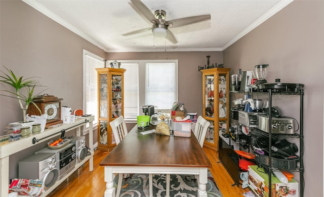 236 Leland Dr, Shreveport, LA 71105 - dining room with a ceiling fan, wood finished floors, and crown molding