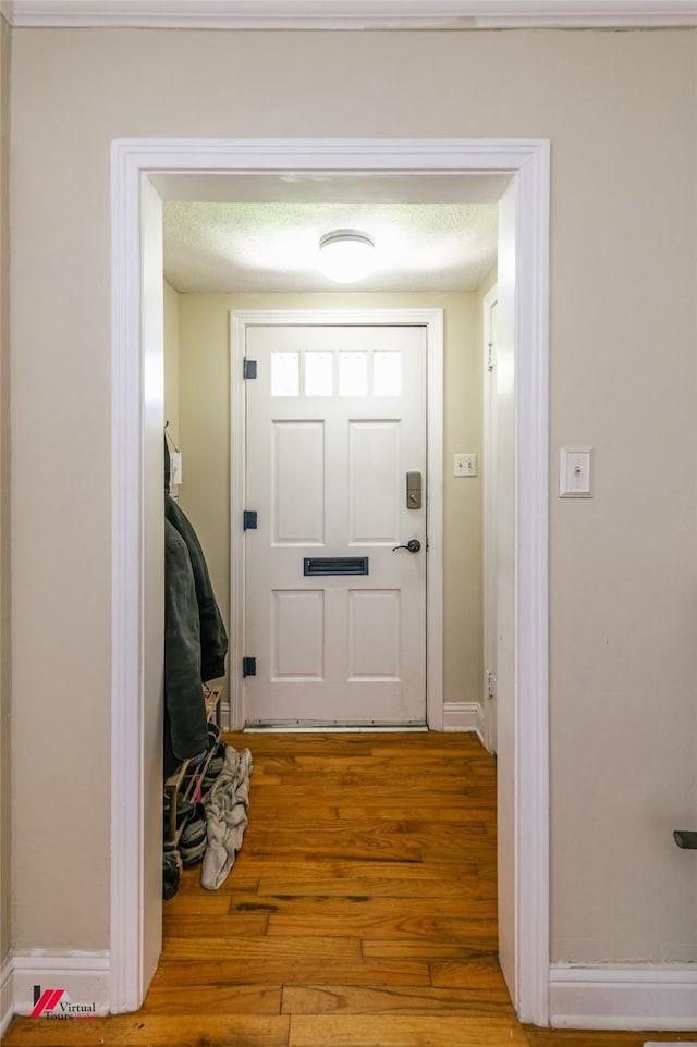 236 Leland Dr, Shreveport, LA 71105 - doorway featuring hardwood / wood-style flooring and baseboards