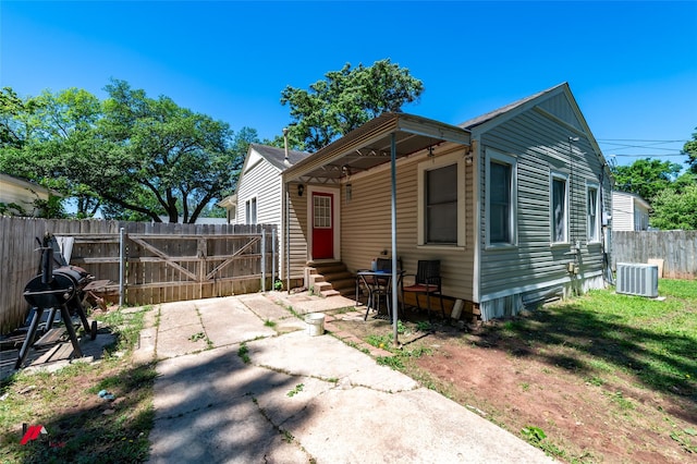 236 Leland Dr, Shreveport, LA 71105 - view of front of property with entry steps, central AC, fence, and a patio