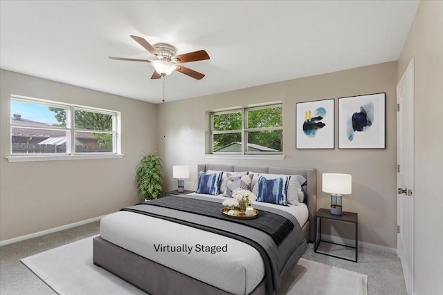 200 Herberta St, Pottsboro, TX 75076 - carpeted bedroom featuring multiple windows, baseboards, and a ceiling fan