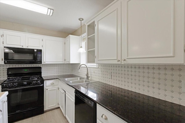 200 Herberta St, Pottsboro, TX 75076 - kitchen with black appliances, a sink, and white cabinetry