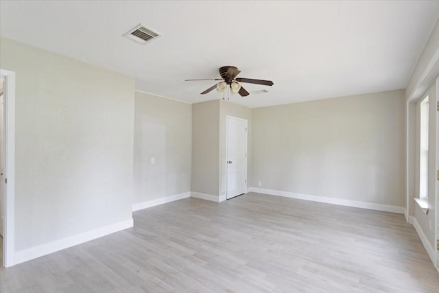 200 Herberta St, Pottsboro, TX 75076 - spare room with a ceiling fan, light wood-style floors, baseboards, and plenty of natural light