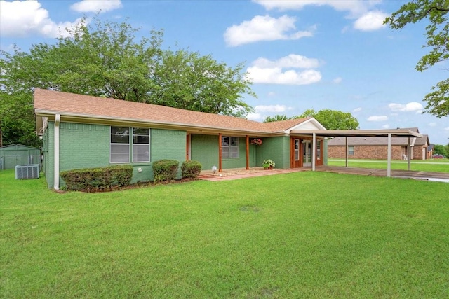200 Herberta St, Pottsboro, TX 75076 - single story home featuring a front yard, cooling unit, brick siding, a carport, and covered porch