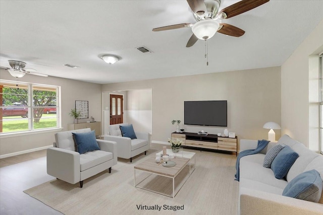 200 Herberta St, Pottsboro, TX 75076 - living area featuring a ceiling fan and baseboards