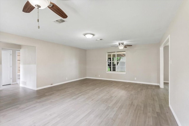 200 Herberta St, Pottsboro, TX 75076 - spare room with a ceiling fan, light wood-style flooring, and baseboards