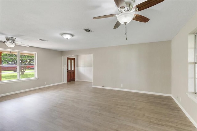 200 Herberta St, Pottsboro, TX 75076 - unfurnished room featuring a ceiling fan, light wood finished floors, and baseboards