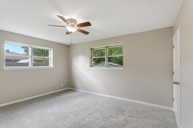 200 Herberta St, Pottsboro, TX 75076 - spare room with plenty of natural light, carpet flooring, ceiling fan, and baseboards