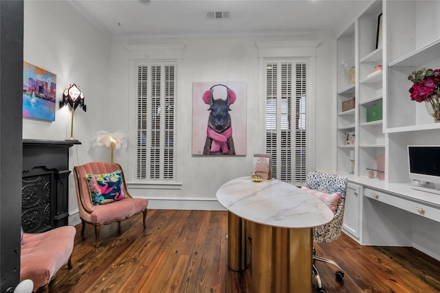 417 Windwood Ct, Mckinney, TX 75071 - home office featuring hardwood / wood-style flooring, built in study area, baseboards, and crown molding
