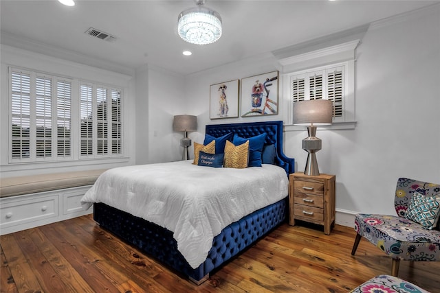 417 Windwood Ct, Mckinney, TX 75071 - bedroom with ornamental molding, wood finished floors, a chandelier, and recessed lighting