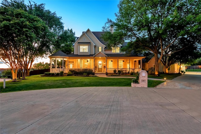 417 Windwood Ct, Mckinney, TX 75071 - view of front of house with covered porch and a front lawn