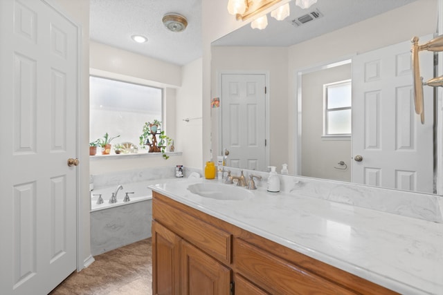 2521 Trail Tree Ct, Burleson, TX 76028 - full bath with vanity and a garden tub