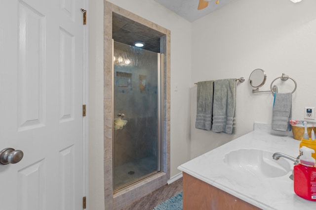 2521 Trail Tree Ct, Burleson, TX 76028 - bathroom featuring a stall shower, vanity, and ceiling fan