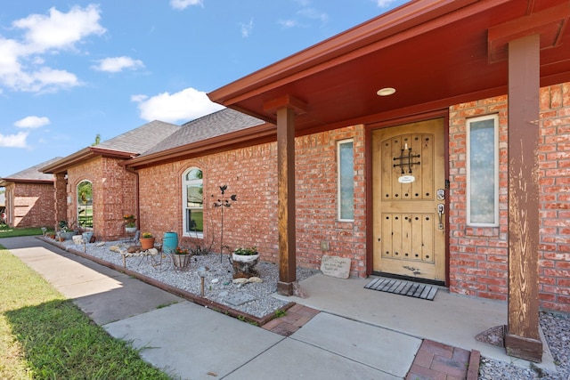 2521 Trail Tree Ct, Burleson, TX 76028 - property entrance featuring roof with shingles and brick siding